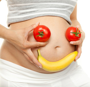 lachender bauch schwangerschaft obst gemüse